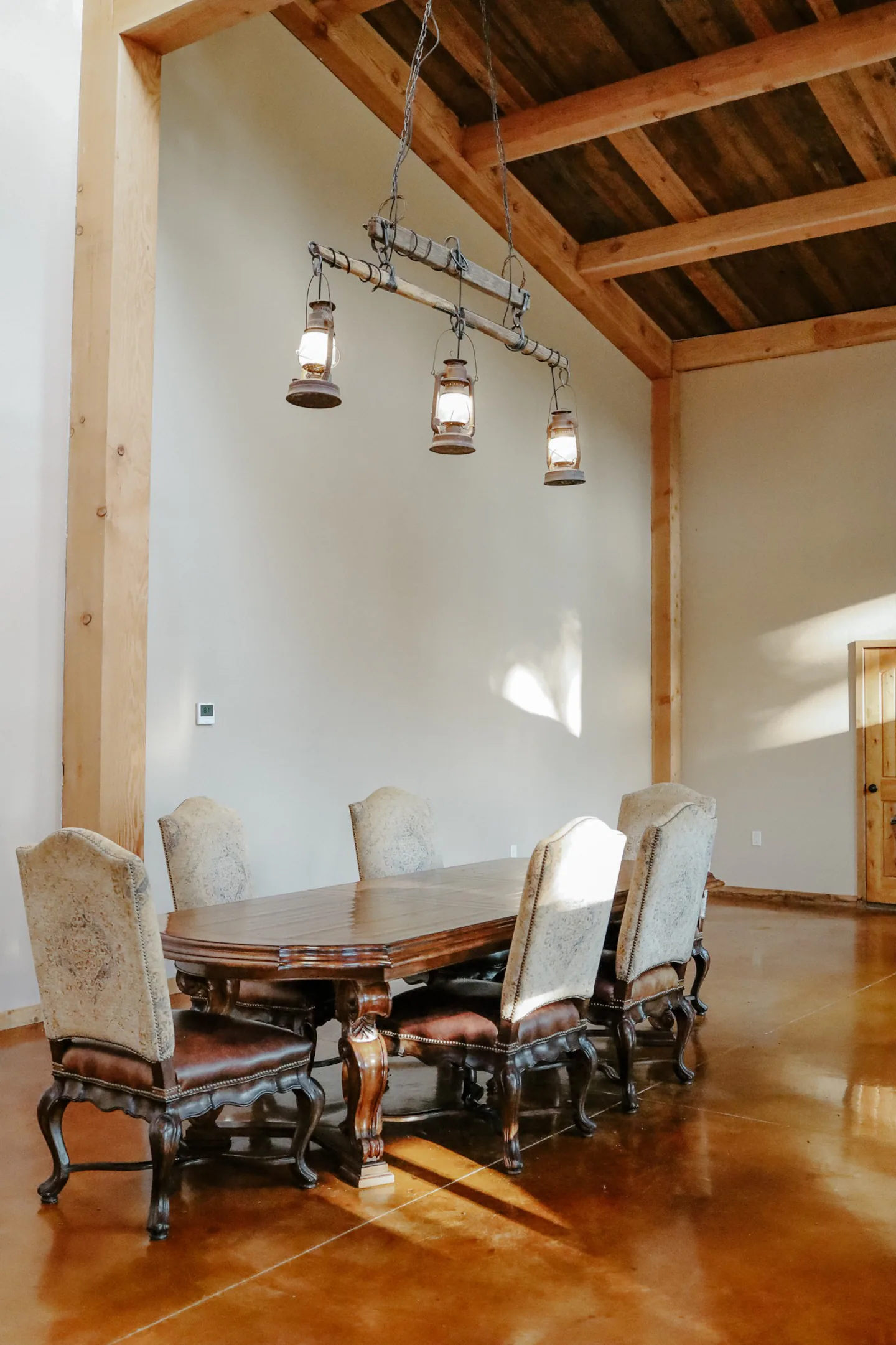 large dining room table with leather chairs
