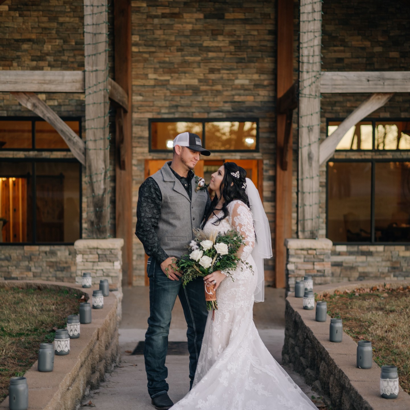 western bride and groom outside Back In The Pines venue