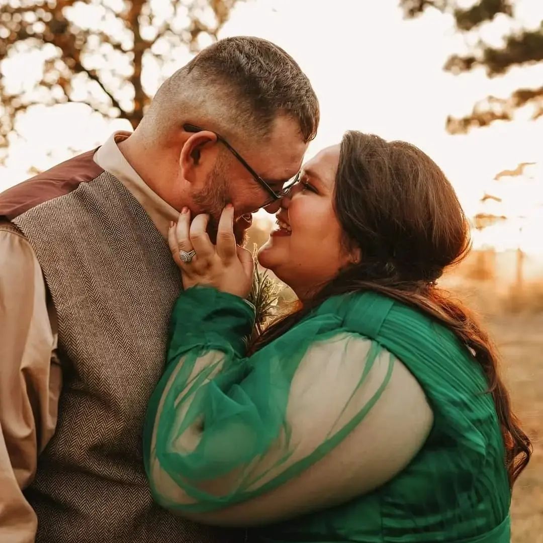 bride and groom about to kiss