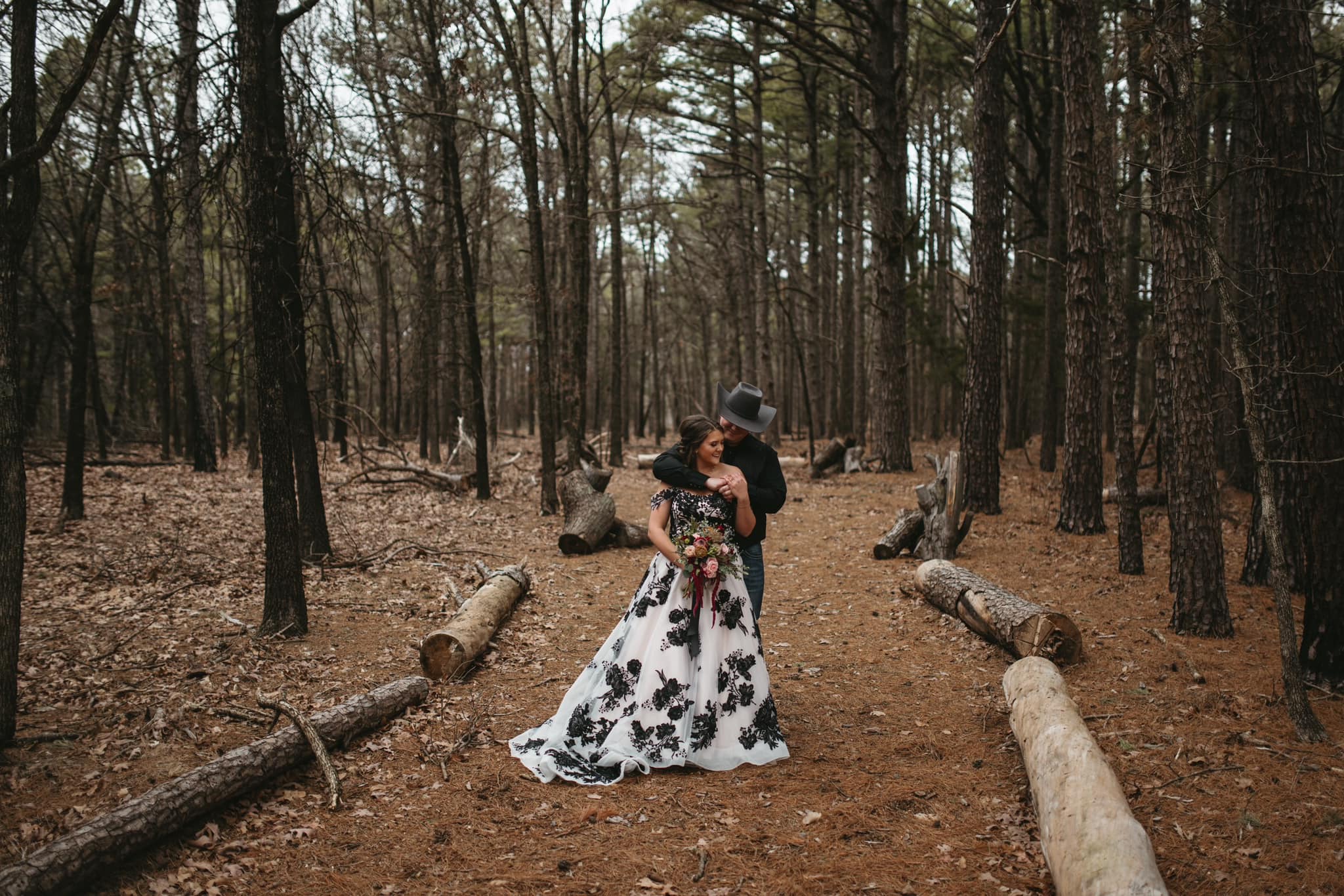 groom and bride wearing black and white dress