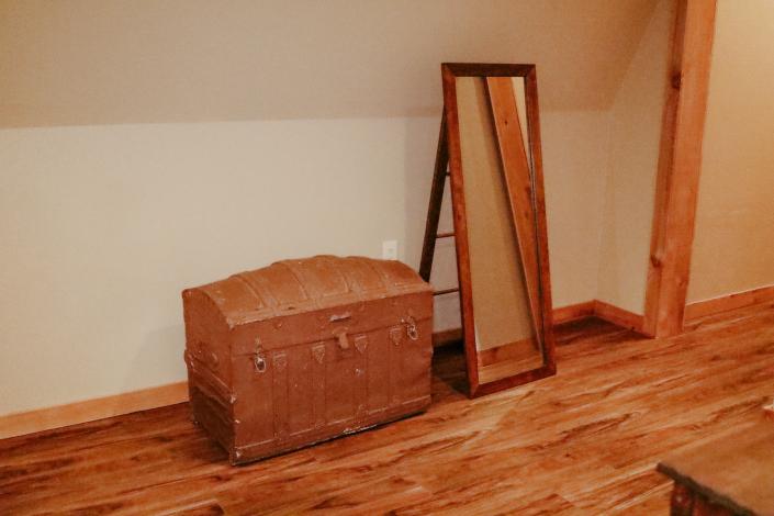 mirror and antique trunk